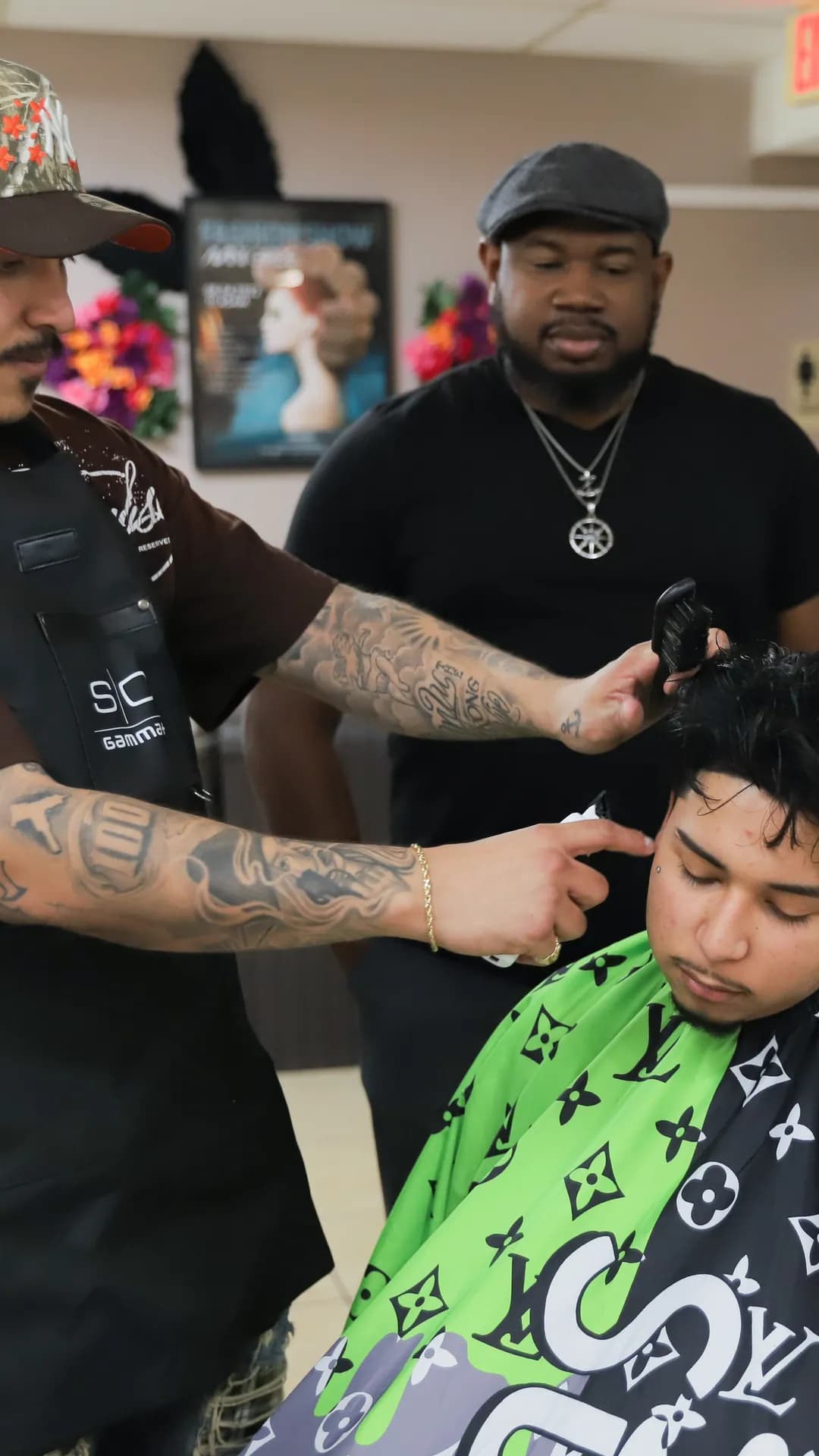 Young cosmetologist learning clipper techniques