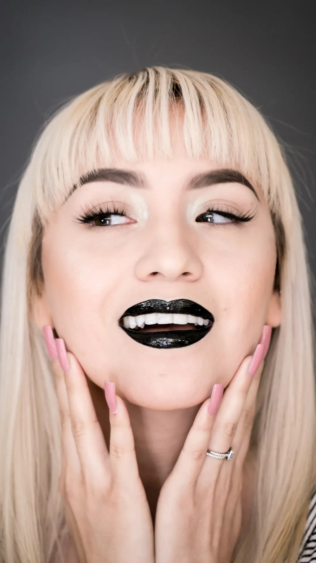 Young PMU artist in modern beauty studio