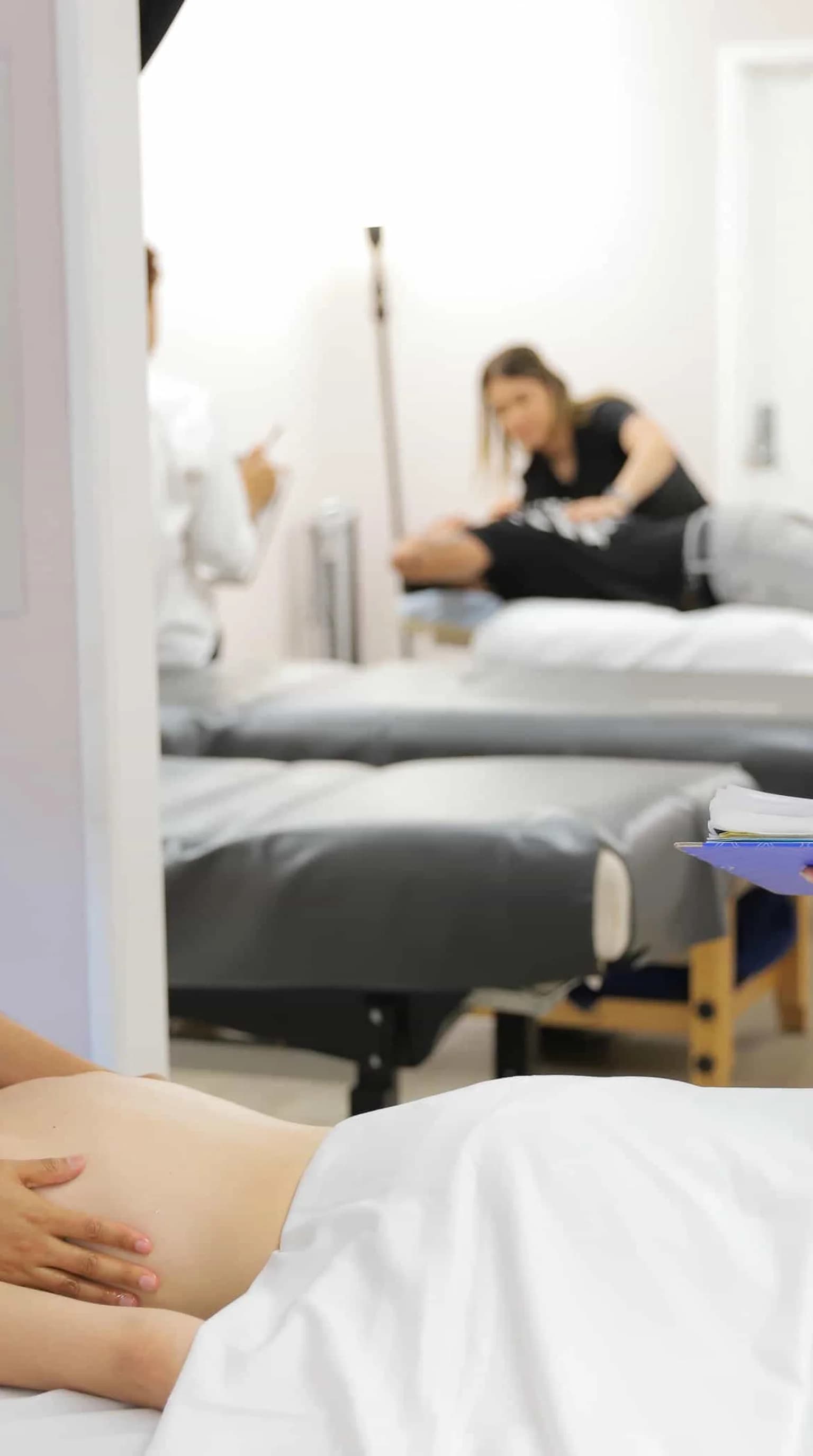 Massage therapy practice owner in clinical setting