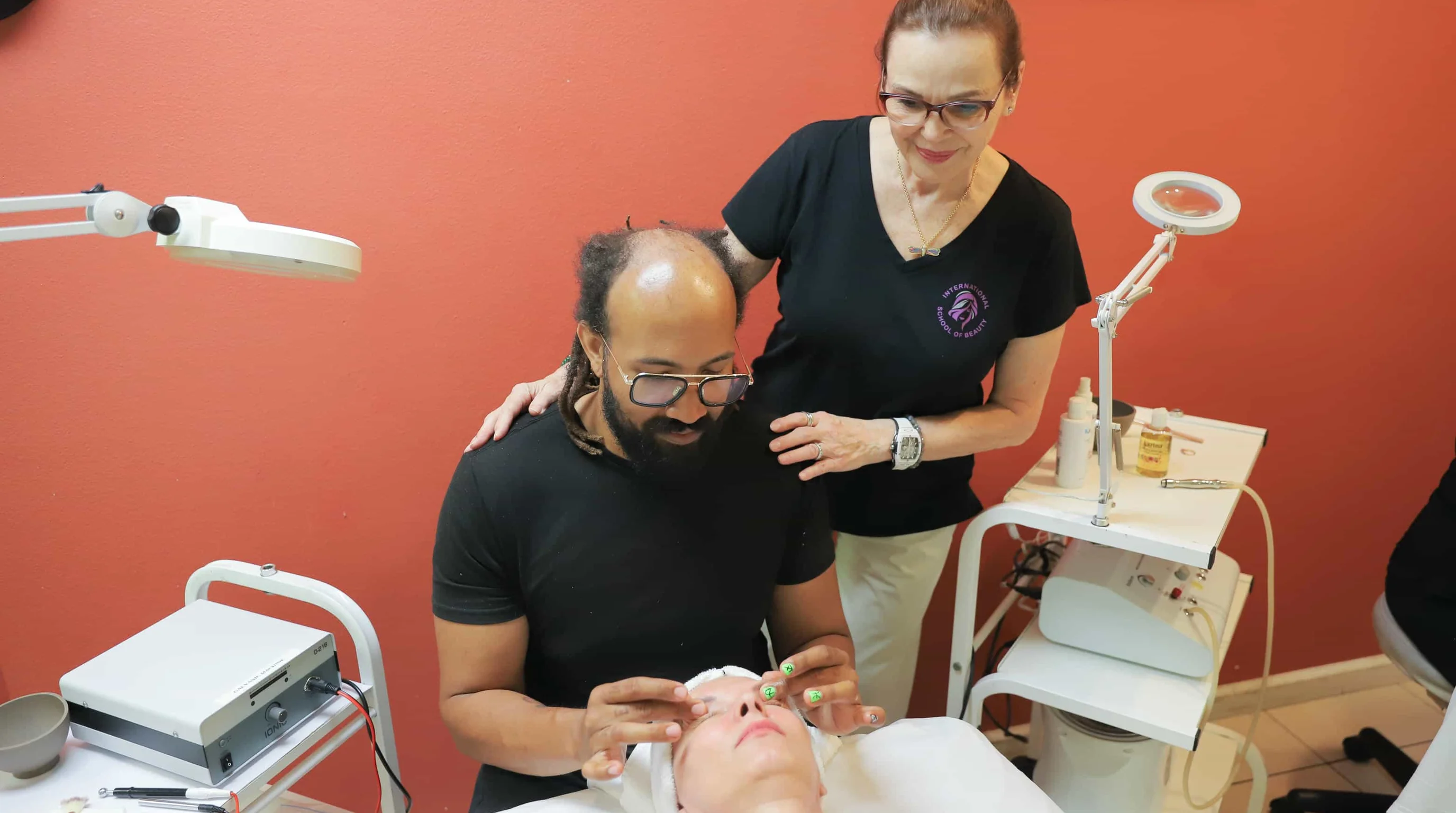 Esthetician performing facial treatment on client