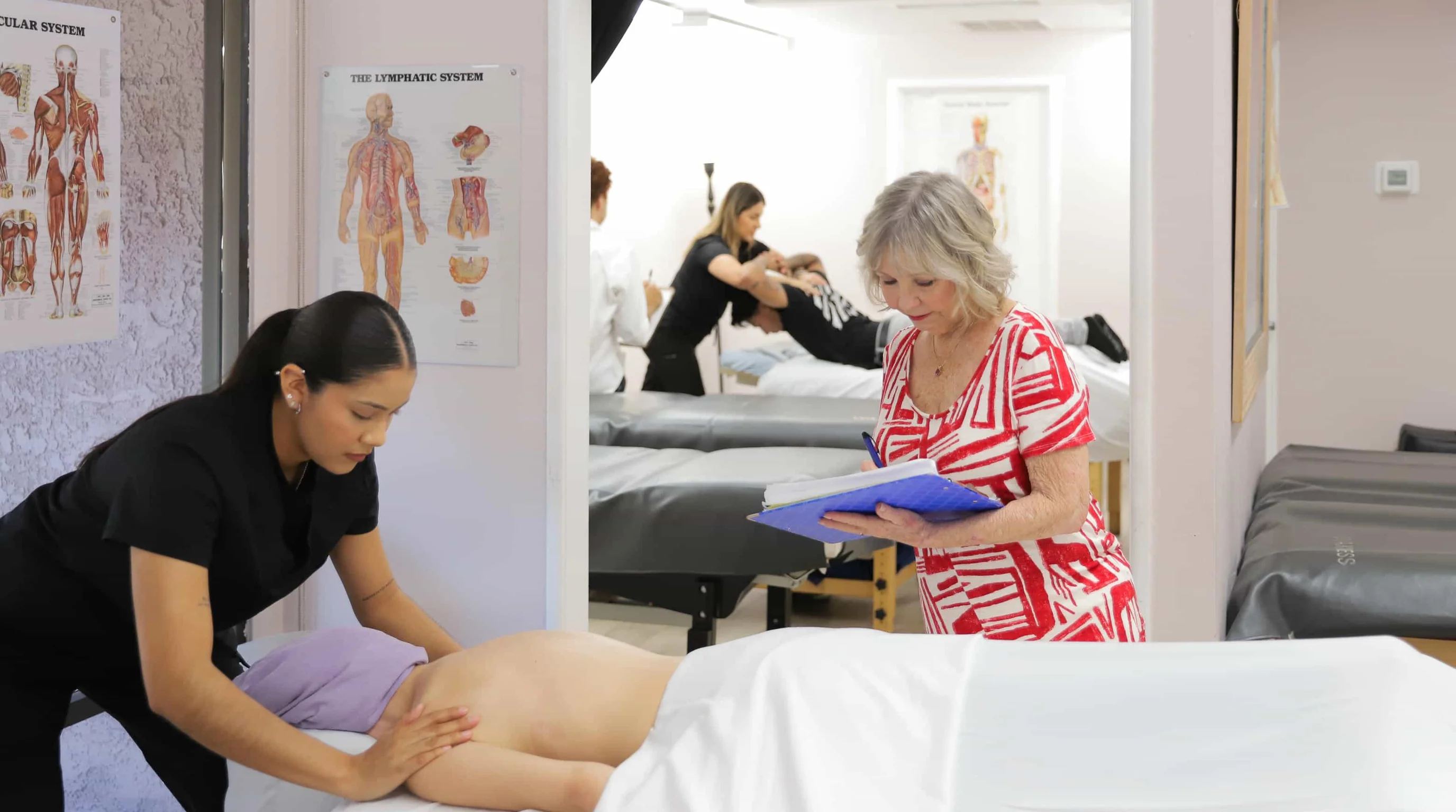 Massage therapist in treatment room